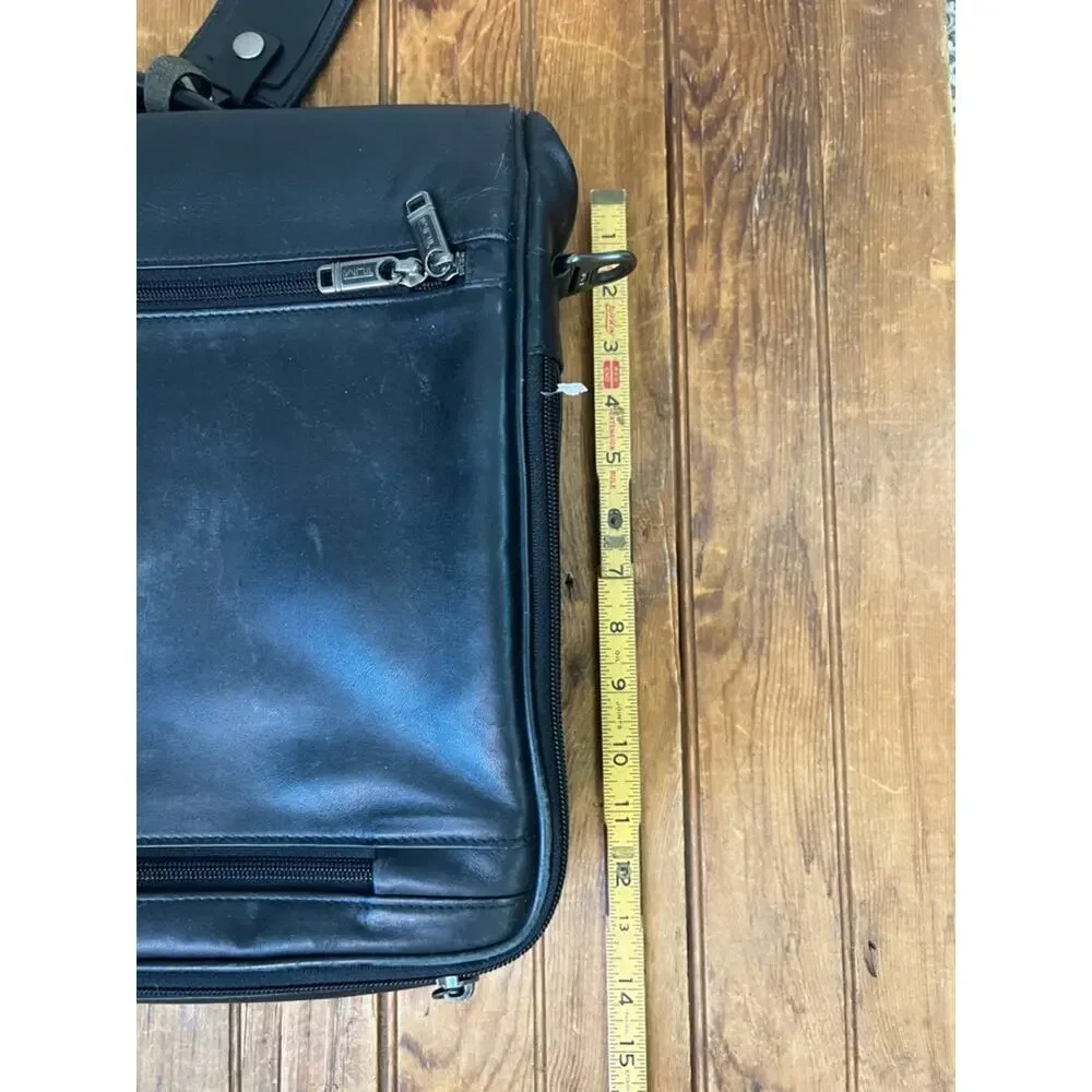 Tumi black leather